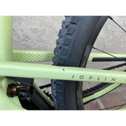 2024 Juliana Joplin 4 CC 29 X0 AXS, Medium — BLEM bike, chainstay blemish view.