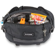 Dakine Hot Laps Pack 5L Hip Pack, Black. Modeled with bike accessories.