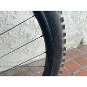 2025 Santa Cruz Vala 1 CC MX  X0 AXS RSV, Medium Demo Bike, Drive Side Front Wheel Scratches