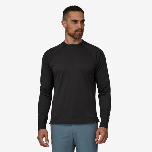 Patagonia Men's Long Sleeve Dirt Craft Jersey, black, front view on model.