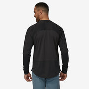 Patagonia Men's Long Sleeve Dirt Craft Jersey, black, back view on model.