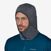 Patagonia Men's Airshed Pro Pullover, lagom blue, hood on view on model.