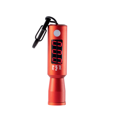 Red digital device with a keychain on a white background