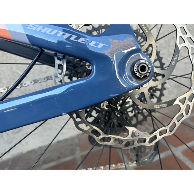 Pivot Shuttle LT Pro X0 Eagle w/ Mixed Alloy Wheels, Small Demo Bike, Non Drive Side Near Axle Blemishes