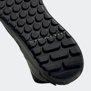 Five Ten Trailcross Mid Pro Mountain bike shoe, Core Black / Grey Two / Solar Red, tread view.