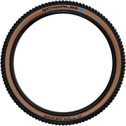 Schwalbe Wicked Will 29 x 2.4, Black/Tan, Super Race, Addix SpeedGrip Mountain Bike Tire, profile view.