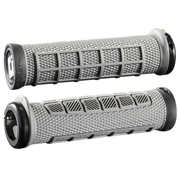 A pair of ODI Elite Pro bike grips in graphite black color with a lock-on design and half-waffle pattern.