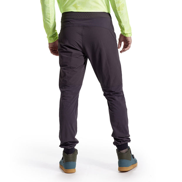 Pearl Izumi Men's Elevate Pants, black, back view on model.