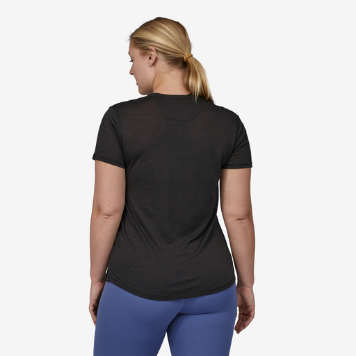 Patagonia Women's Capilene Cool Merino Shirt, black, back view on model, size large.