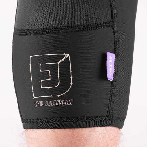 Black compression shorts with a logo and text on a white background
