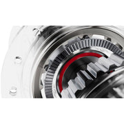Close-up of a mechanical gear system with red accents