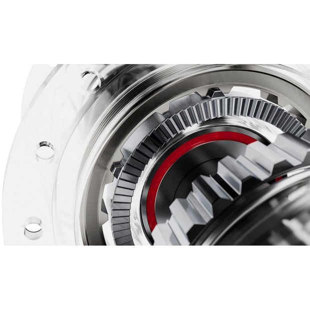 Close-up of a mechanical gear system with red accents