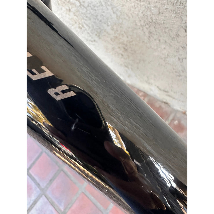 2023 Giant Reign 2, metal black, *BLEM*, top tube view.