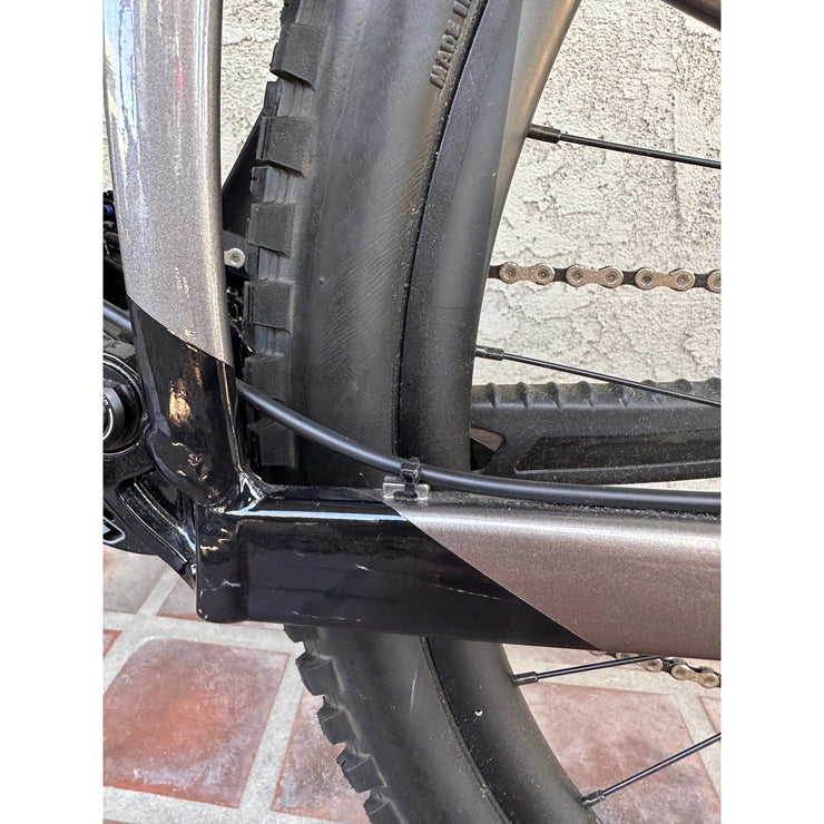 2023 Giant Reign 2, metal black, *BLEM*, rear wheel close-up view.