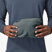 Patagonia Nano Air Light Vest nouveau green, back view, packed.