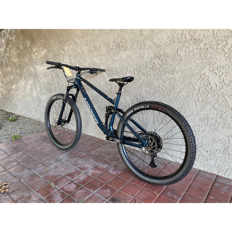 2023 Norco Fluid FS 3 Blue/Silver, *BLEM*, Rear Wheel View.