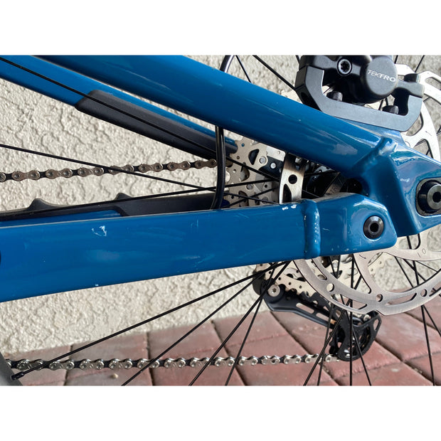 2022 Rocky Mountain Instinct A10, blue/green, *BLEM*, chain stay view.