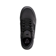Black athletic shoe on a white background