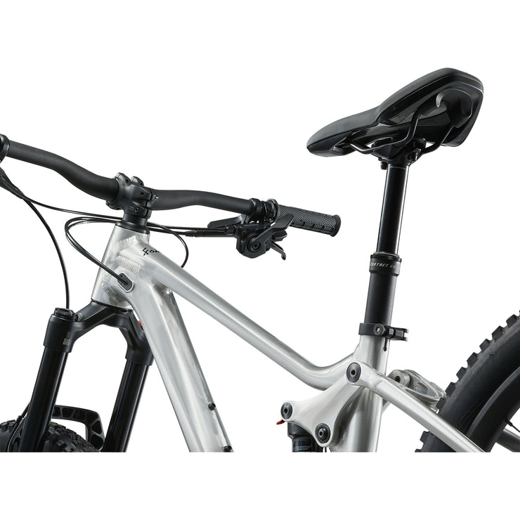 Giant Faith 24” Kid’s Mountain Bike, Raw aluminum, saddle view.