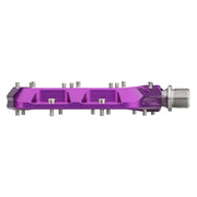 Wolf Tooth Waveform Aluminum Pedals, uv purple, profile view.