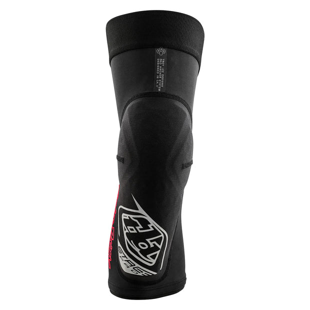 Black knee pad with a brand logo on a white background