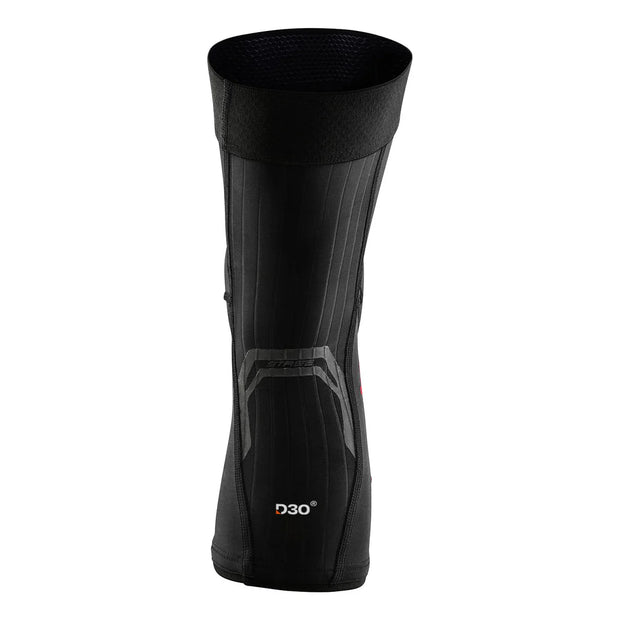 Black shin guard with D30 branding on a white background