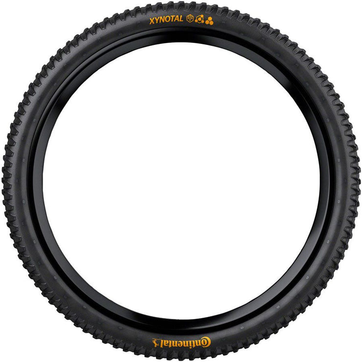 Continental Xynotal Tire - 27.5 x 2.40 Tubeless Folding BLK Soft Downhill Casing E25, side view.