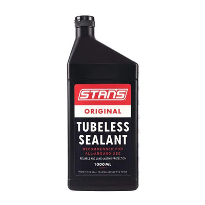 Black bottle of Stans Original Tubeless Sealant on a white background