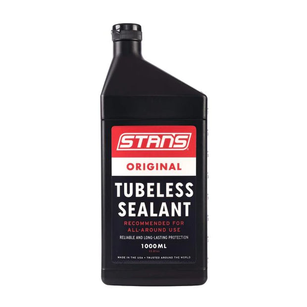 Black bottle of Stans Original Tubeless Sealant on a white background