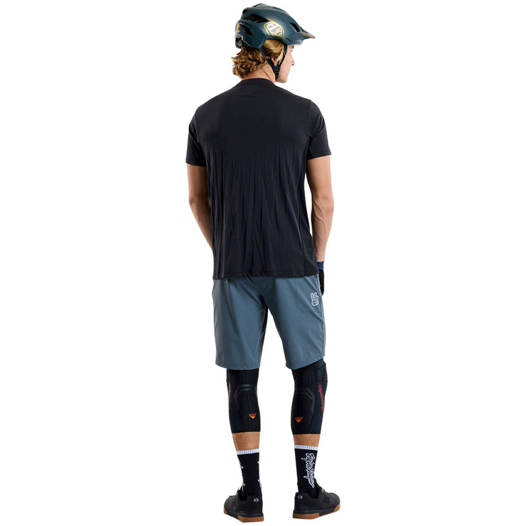 Troy Lee Designs Skyline Short Sleeve Ride Tee, black, back view on model. 