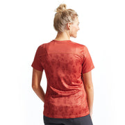 Pearl Izumi Women's Summit Short Sleeve Jersey, adobe birds, back view, on model.