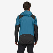 Patagonia Dirt Roamer Storm Jacket, wavy blue, back view on model.