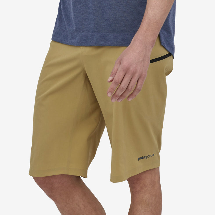 Patagonia Men's Dirt Roamer Bike Shorts, Moray Khaki, Side view on the model