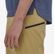 Patagonia Men's Dirt Roamer Bike Shorts, Moray Khaki, Closer view of side pocket on the model
