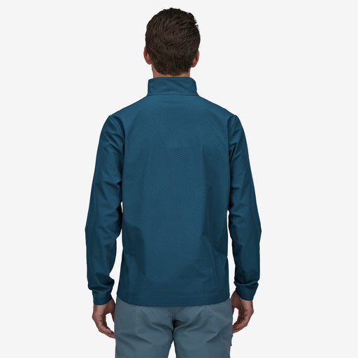 Patagonia R1 Crossstrata, lagom blue, back view on model.