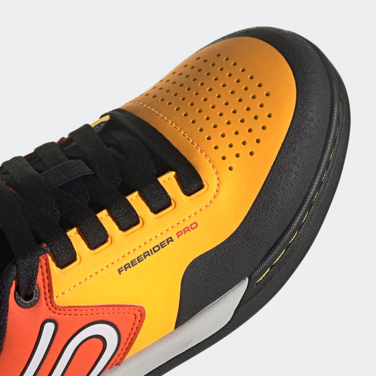 Five Ten Men's Freerider Pro Shoe Media 28 of 36, solar gold / cloud white / impact orange, toe box view.