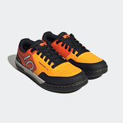 Five Ten Men's Freerider Pro Shoe Media 28 of 36, solar gold / cloud white / impact orange, side view pair.