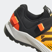 Five Ten Trailcross Clip-In Men's Mountain Bike Shoe, Solar Gold / Core Black/ Impact Orange, heel view.