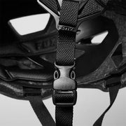 FOX Mainframe Youth Helmet, black/black, strap close-up view.