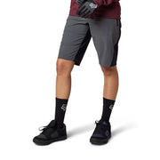 FOX Women's Ranger Water Mountain Bike Shorts, dark shadow, full view on model.