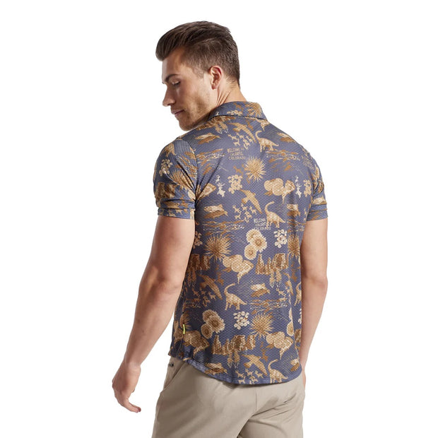 Pearl izumi Canyon Tech Snap Short Sleeve, dark ink coslope, back view on model.