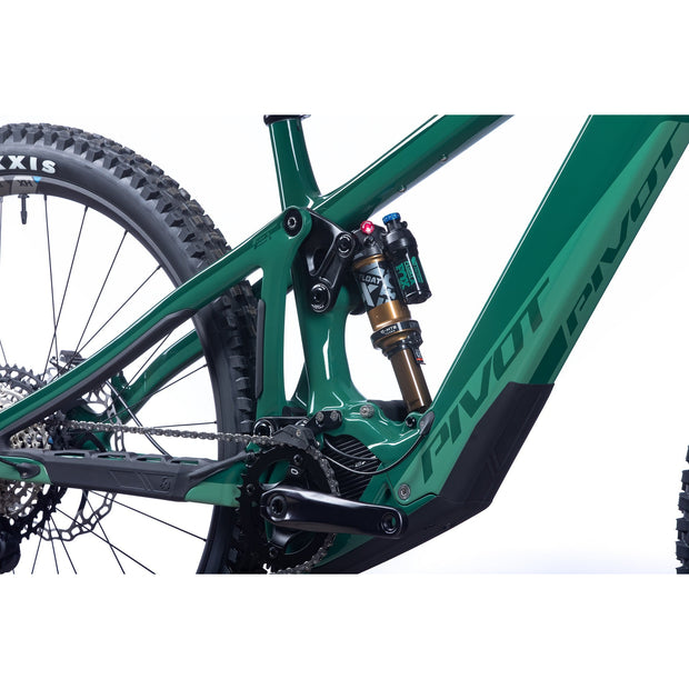 2023 Pivot Shuttle LT RIDE SLX/XT 29, Northern Lights Green, rear shock close-up view.