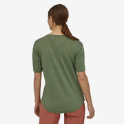 Patagonia Women's Short-Sleeved Merino Bike Jersey, Camp Green, Back view on the model