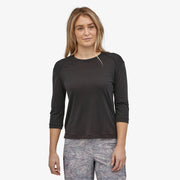 Patagonia Women's Merino 3/4-Sleeved Bike Jersey, black, front view on model.