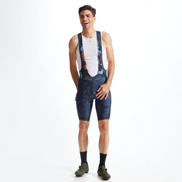 Pearl Izumi Expedition Pro Bib Short, Dark Ink Floral, full body view of model