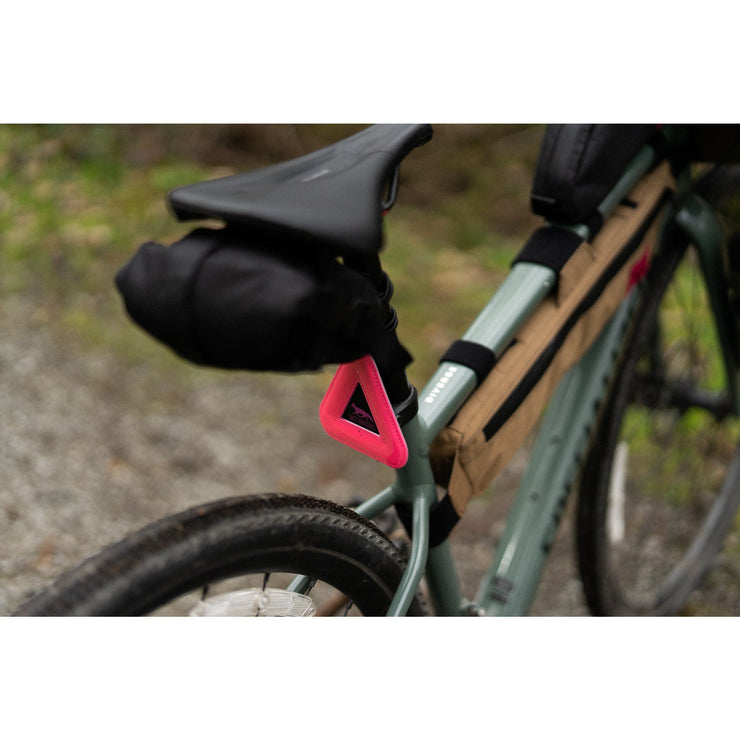 Swift Industries Campout Reflective Triangle, pink, seat post view.